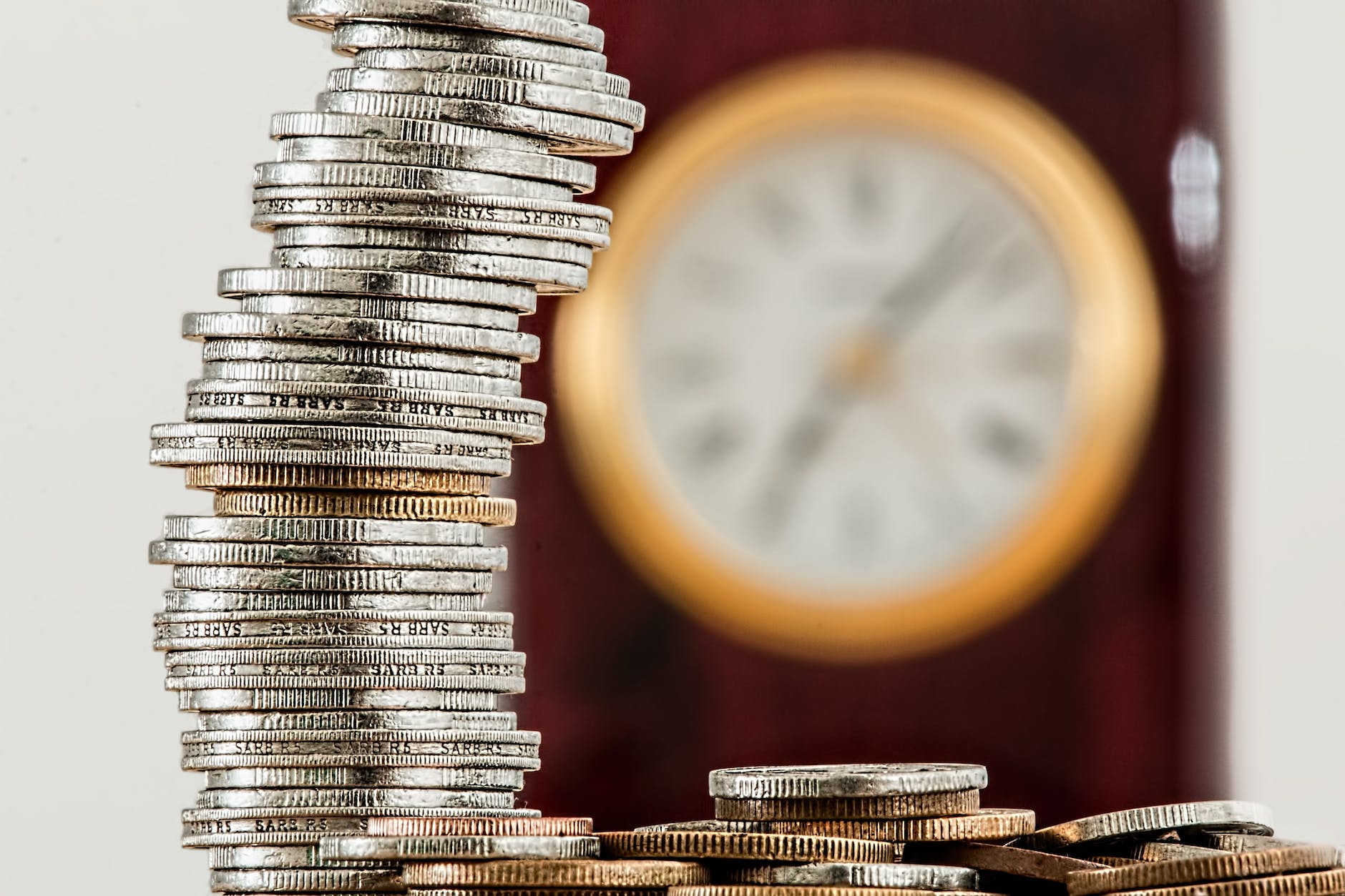 selective focus photo of stacked coins for instant cash loan